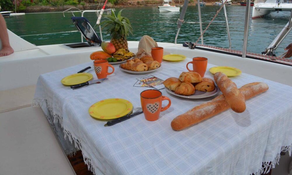 Catamaran Lagoon 380 with crew in le cratère marina, Nosy Be, Madagascar - Image 10