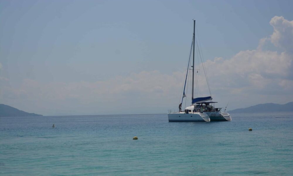 Catamaran Lagoon 380 with crew in le cratère marina, Nosy Be, Madagascar - Image 7