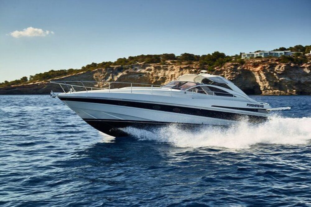 Motor yacht, features a spacious galley, bathroom, and master cabin.
