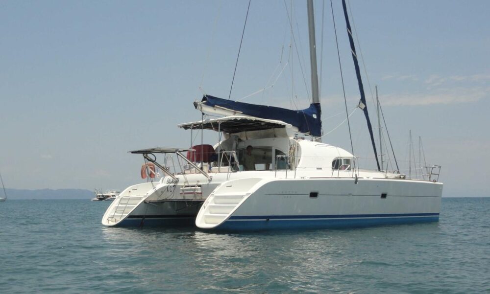 Catamaran Lagoon 380 with crew in le cratère marina, Nosy Be, Madagascar - Image 17