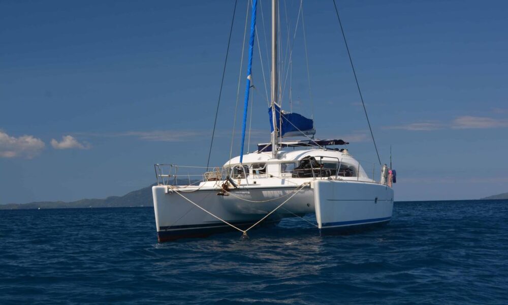 Catamaran Lagoon 380 with crew in le cratère marina, Nosy Be, Madagascar - Image 16