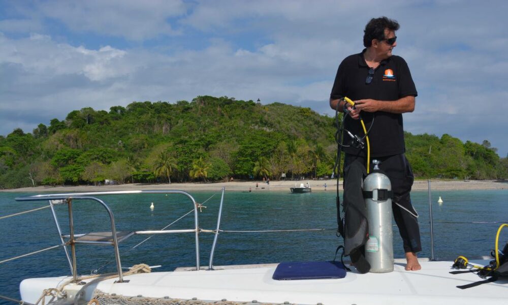 Catamaran Lagoon 380 with crew in le cratère marina, Nosy Be, Madagascar - Image 13